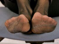 Goddess Melanie sweaty nylon feet