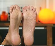 hot dark hair woman show feet in pantyhose and barefeet