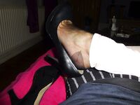 Secretary sweaty nylon feet after work