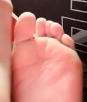 Foot slut shows her sexy wrinkled soles