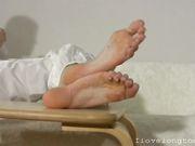 Barefoot girl and white trousers