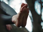 LAUREN'S BAREFEET IN THE WOODS