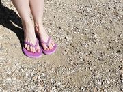 Emily red toes and purple flip flops