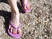 Emily red toes and purple flip flops