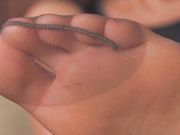 Noemis World - Miranda in tan sheer nylons