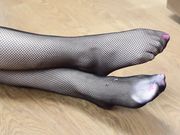 The Sole Mates - Kip Poses Her Feet In Fishnets And Bare