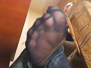 Takes her sexy boot off and shows toes in sweaty nylon