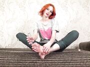 redhead girl with big soft soles is teasing