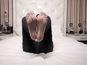 young redhead girl tease her small feet in fishnets