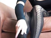 woman tease with her sexy small feet in black stocking