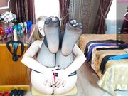 small blonde show her sexy feet in pantyhose