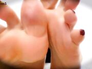 Miss Venom shows her sexy soles and long nails