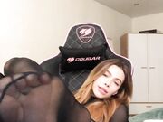 young babe tease with her feet in pantyhose