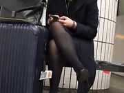 Flight Attendant In Patent Heel Pumps And Tights