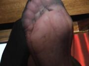 Empress Maxena- sweaty nylon feet under table