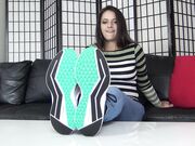 brunette babe tease with her soles on table