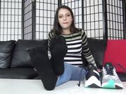 brunette babe tease with her soles on table