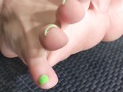 Night green nails and wrinkly soles