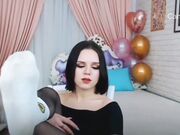 dark hair teen show feet in socks pantyhose barefoot