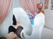 dark hair teen show feet in socks pantyhose barefoot