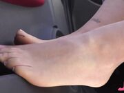 dark hair Italian woman tease with feet in pantyhose