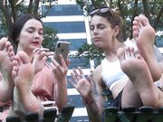 two women show soft soles in public
