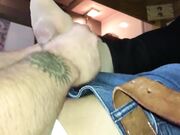 Couple nylon footjob under table