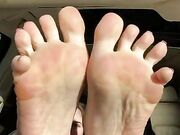 Mary Grace red toes and soles in car