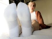 young blonde show soft soles feet