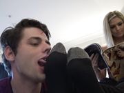 Beautiful Mistress Val ignores a loser licking her socks