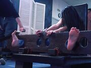 Feet tortured in stocks