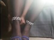 Ebony Woman's Tired Nylons Feet