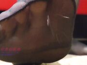 Asian Woman's Amazing Black Pantyhose Feet Domination