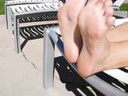 Anna showing her toes by the pool