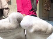 Asian Woman's So Smelly Socks And Barefeet