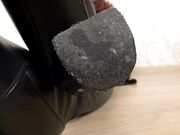 Slave under mistress boot and nylon feet