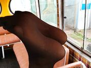 Stinky black pantyhose feet in old school bus foot wors