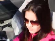 girl driving barefoot