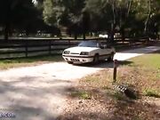girl driving barefoot