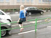 Girn enjoying barefooting in the rain