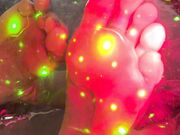 Goddess Gwendolyn Seductive foot soles a play of light and oil  