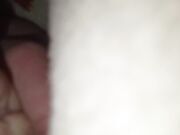 The teen boy lickling his foots