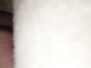 The teen boy lickling his foots