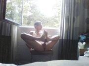 self footjob public window