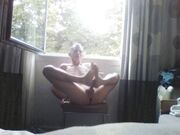 self footjob public window
