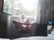 self footjob public window
