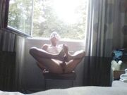 self footjob public window