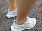 Her sockless feet - training in Adidas Ultra boost