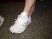 Her sockless feet - training in Adidas Ultra boost
