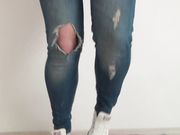 Laura trampling in jeans and gym shoes